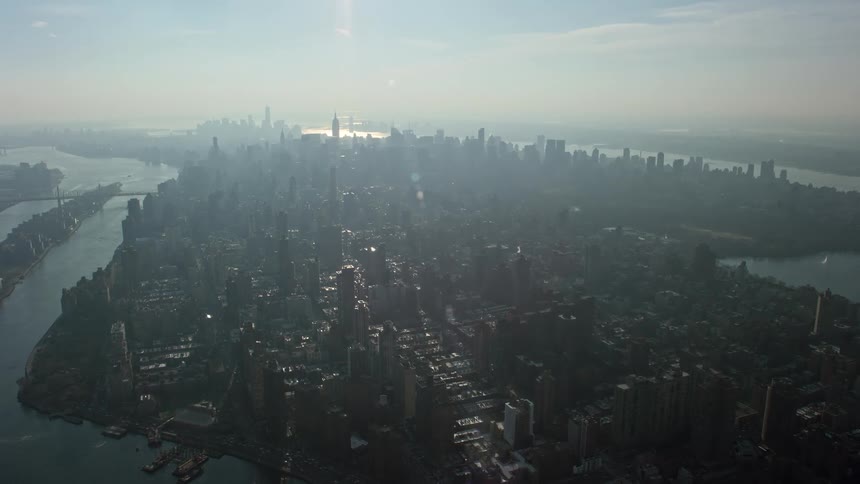 A stunning aerial view of Midtown Manhattan seen from the Upper East Side on a hazy winter day