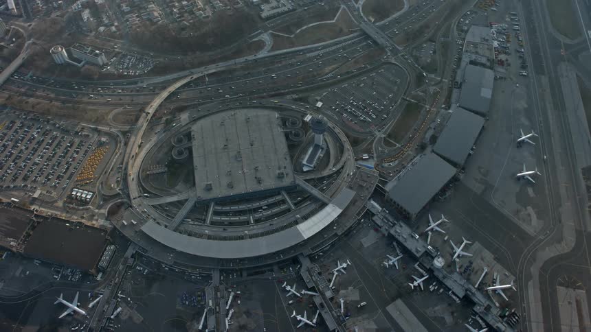 A birds eye view of LaGuardia Airport in Queens New York City during winter showcasing airplanes in transit
