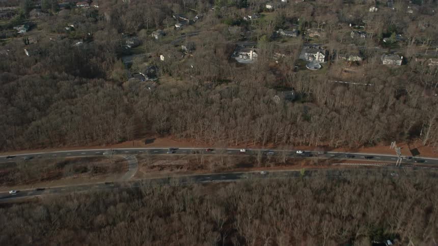 A birds eye view of a suburban community in Plainview Long Island during daytime in the winter