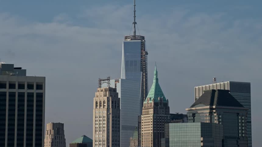 Aerial view of the top of the Freedom Tower in Lower Manhattan New York City on a sunny winter day seen from the East River