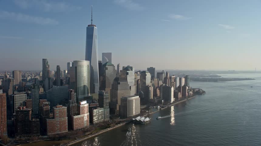 Passing by the iconic World Trade Center skyscrapers in Lower Manhattan during a winter day