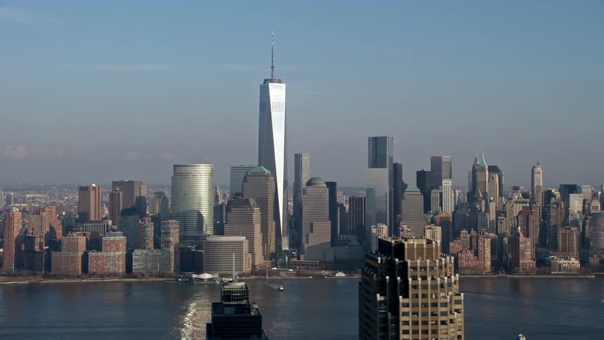 Aerial footage of the Lower Manhattan skyline during winter revealing the iconic Goldman Sachs Tower while showcasing the citys landmarks