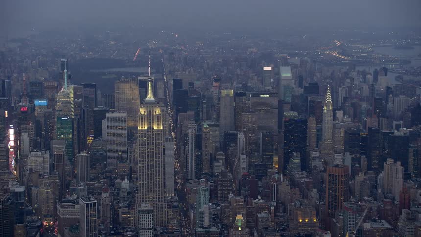 Approaching the iconic Empire State Building at twilight during winter in Midtown Manhattan New York City