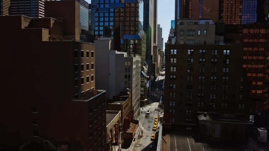 Time lapse of the traffic on a busy city street from dawn to dusk