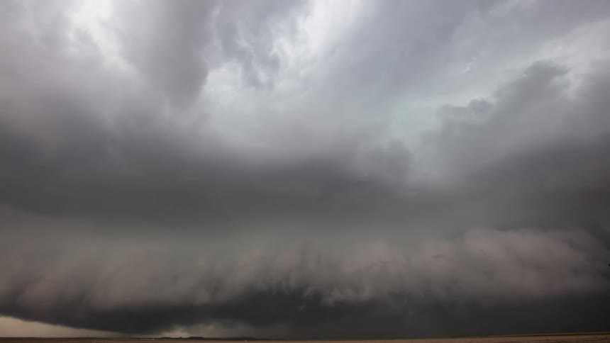 Dark storm clouds move low across the land