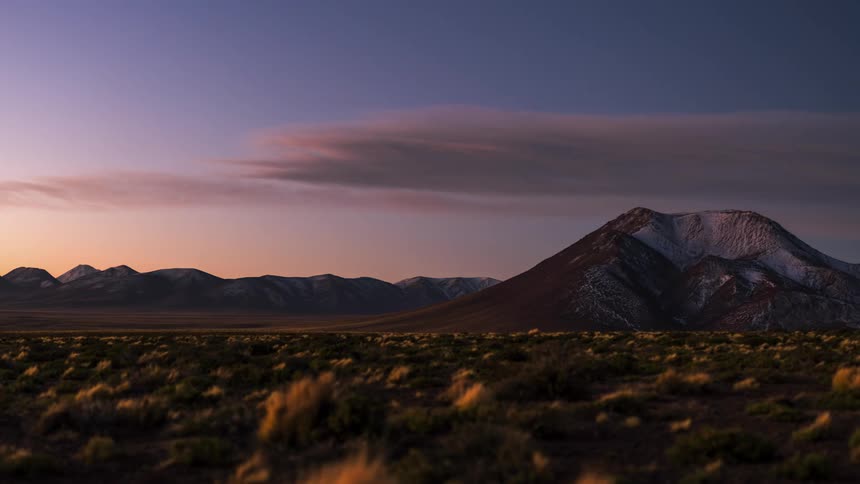 Time lapse view of a mountain is displayed