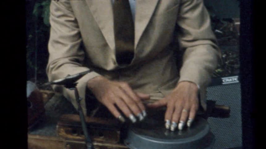 Video footage of a person using vintage electronics