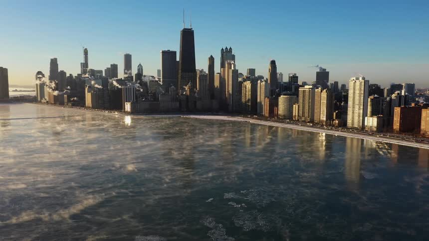 Countless towering buildings pack the chicago city skyline on a clear day