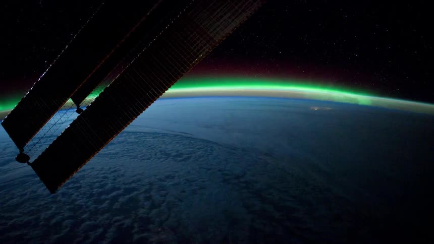 The satellite floats above earth