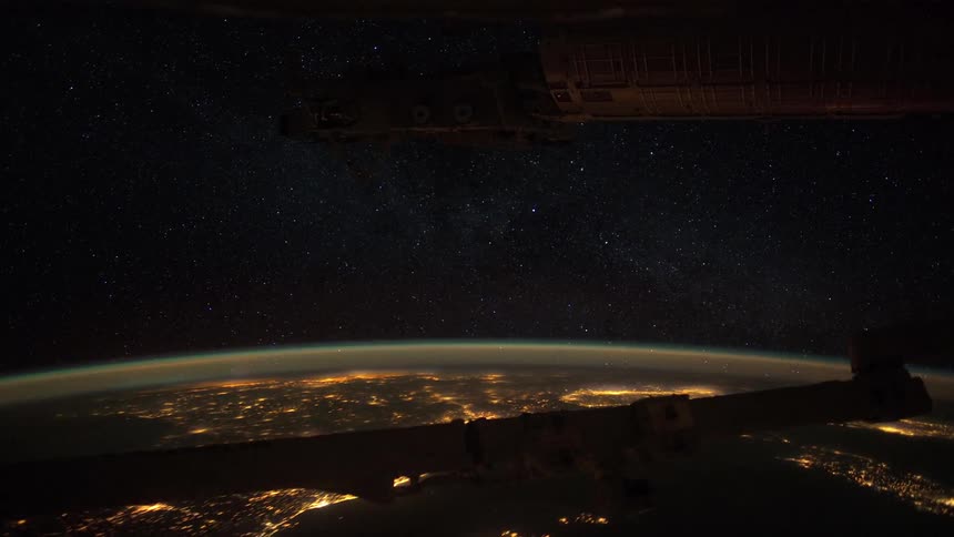 A satellite in space is displayed during the night