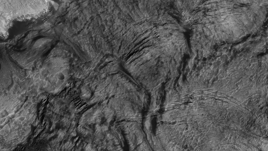 A view flying over the rough surface of a planet