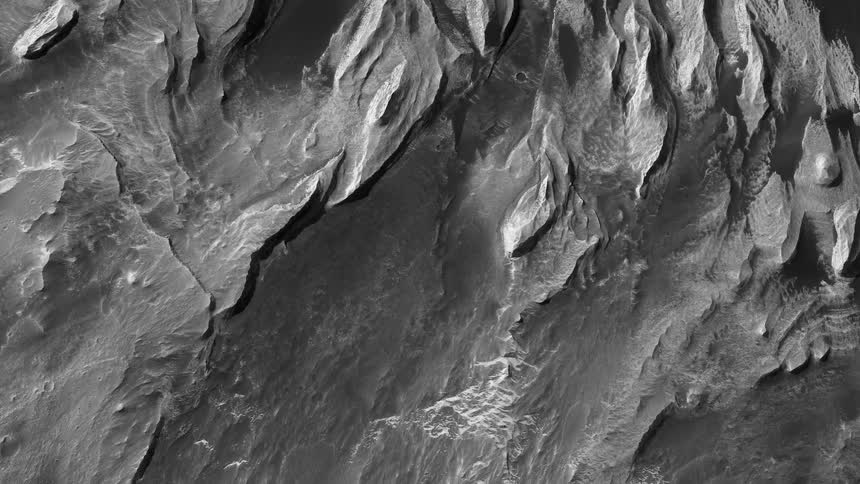 A view flying over the rough surface of a planet