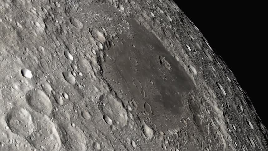 Craters are seen on the surface of the moon as it rotates