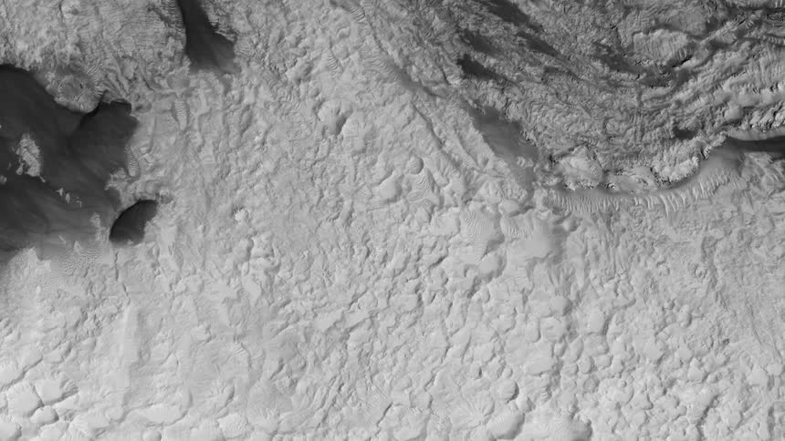Birds eye view of an arctic area is displayed during winter