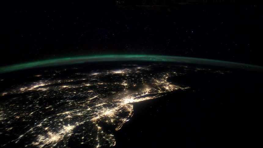 Aerial view of a planet in space is displayed