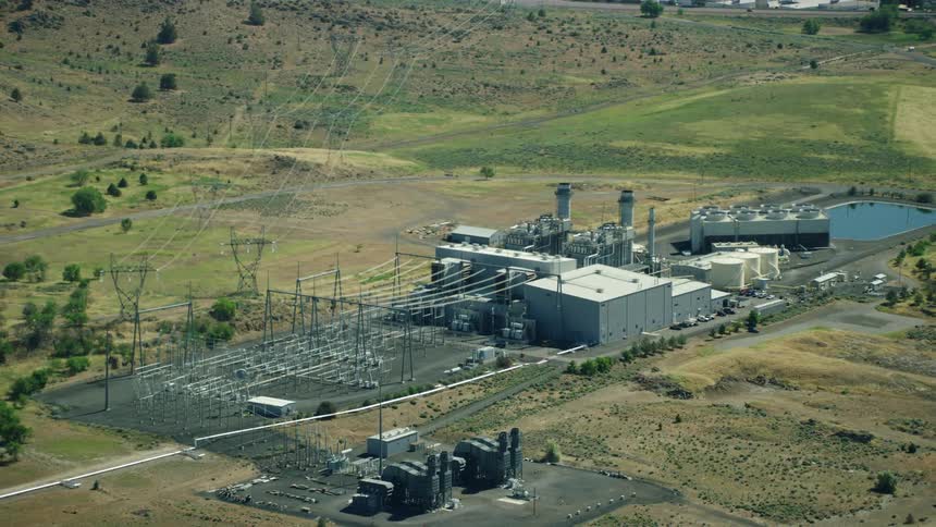 Aerial shot of a utility power plant and transfer station in the hard working USA