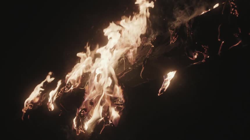 A large piece of wood as it burns