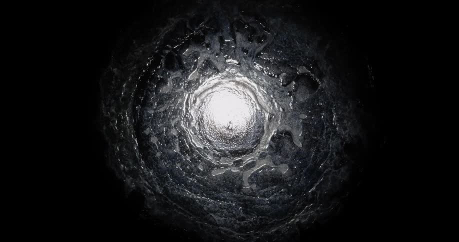 White spreads through black substance around bright center