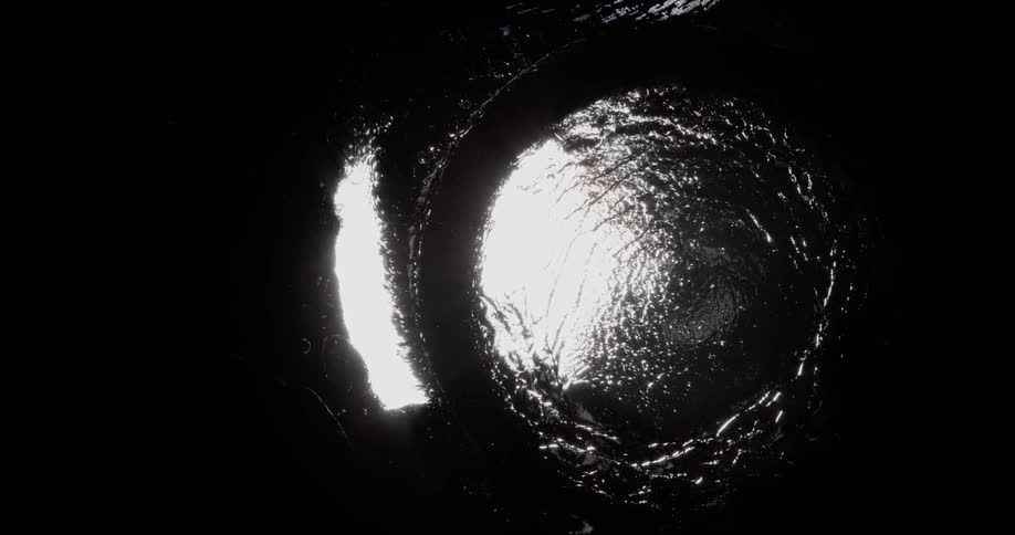 Water ripples at the surface and splashes up