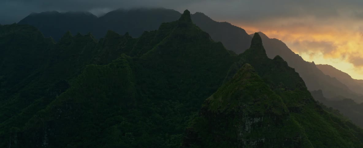 Mountains as the sun is rising in the horizon