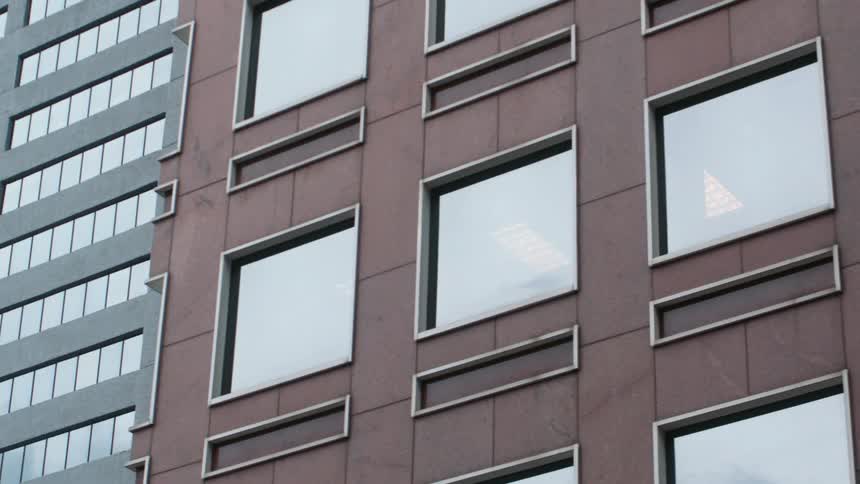 Close up view of skyscrapers is displayed in a downtown city
