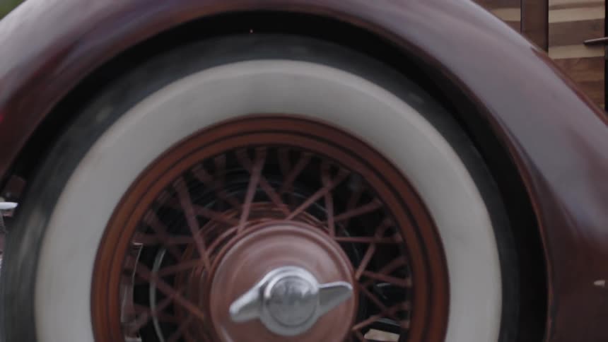 A wheel is slowly turning on a vehicle