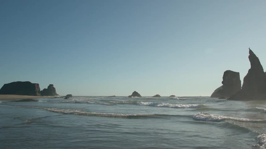 Sea waves wash up along the shore