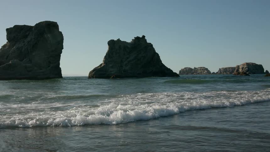 Gentle waves wash onto the beach