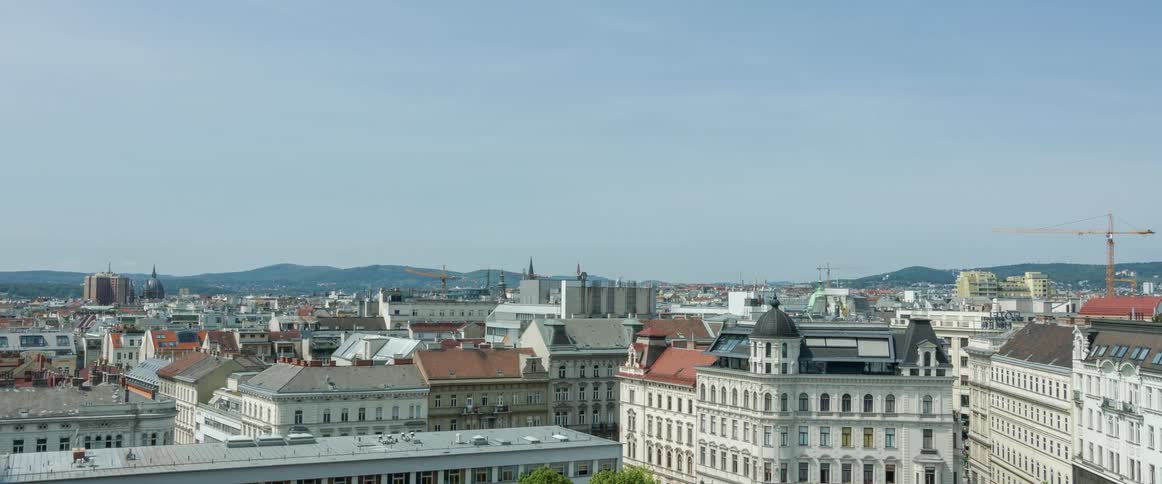 Aerial view of a downtown city is displayed at midday