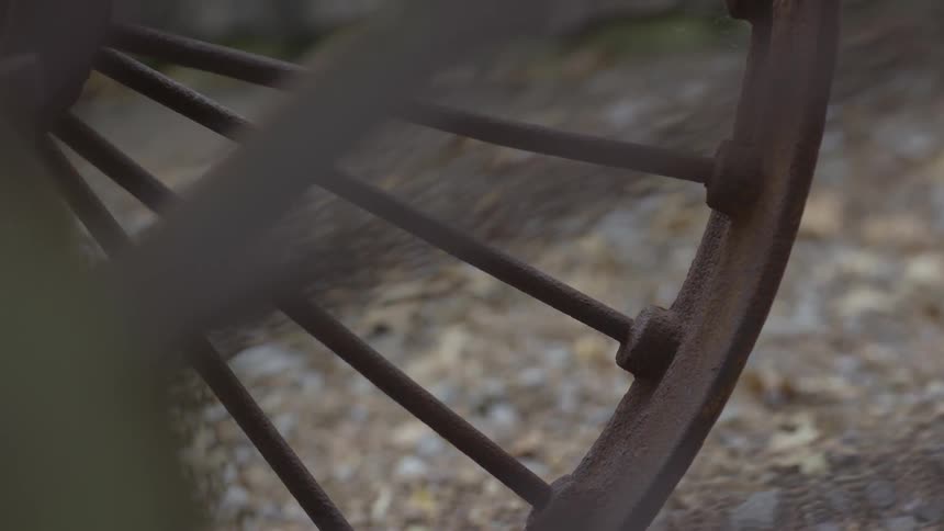 A large wagon wheel is shown