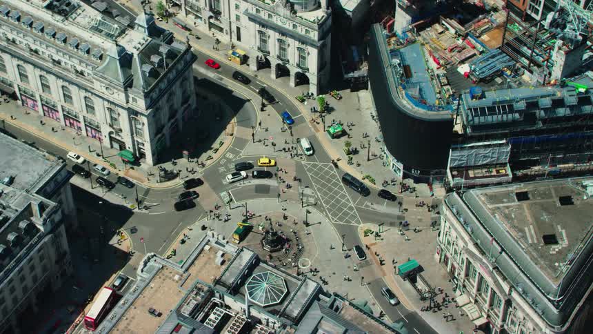 Birds eye view of a downtown city is displayed