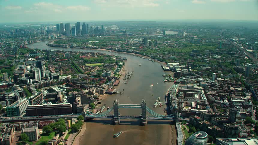 An aerial view of a river with buildings