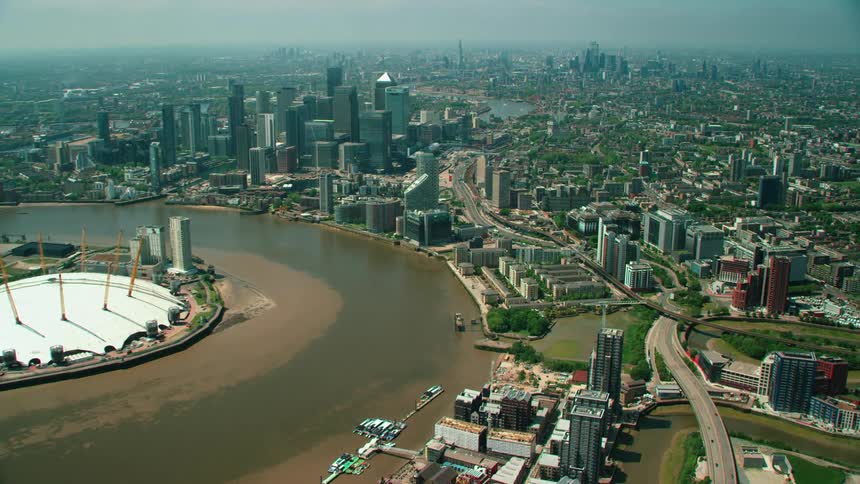 Aerial view of the thames river flowing through the city of london at daytime