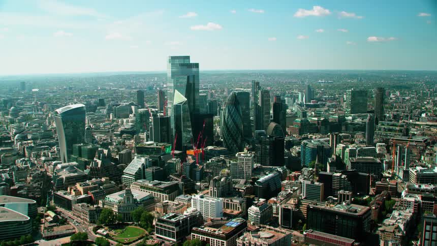Aerial view of a downtown city is displayed