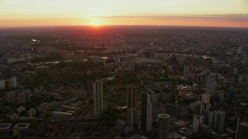 Aerial view of isle of dogs by river thames in east london at sunset