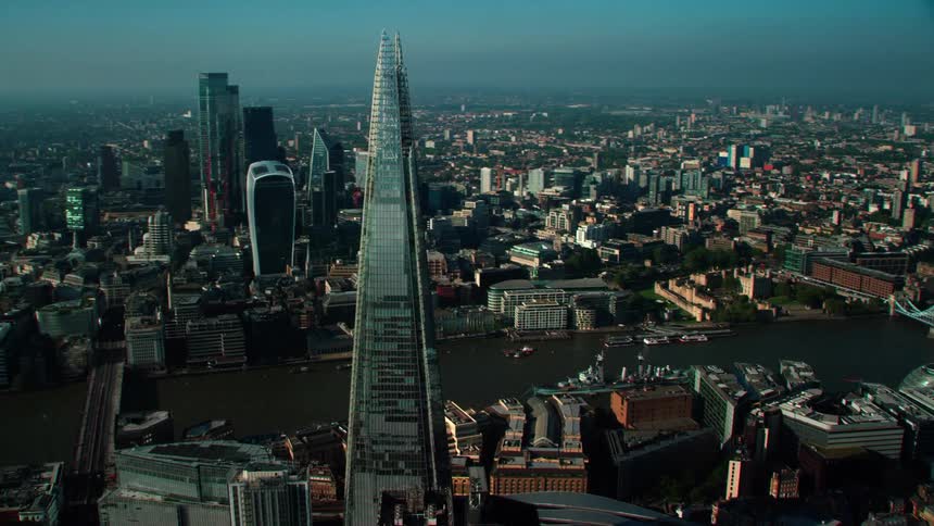 Aerial view of the shard towering over the city of london at daytime