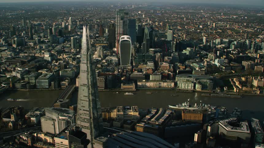 Aerial view of a downtown city is displayed during the daytime