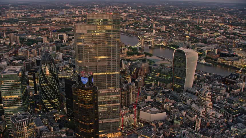Aerial view of tall buildings in the city of london at evening
