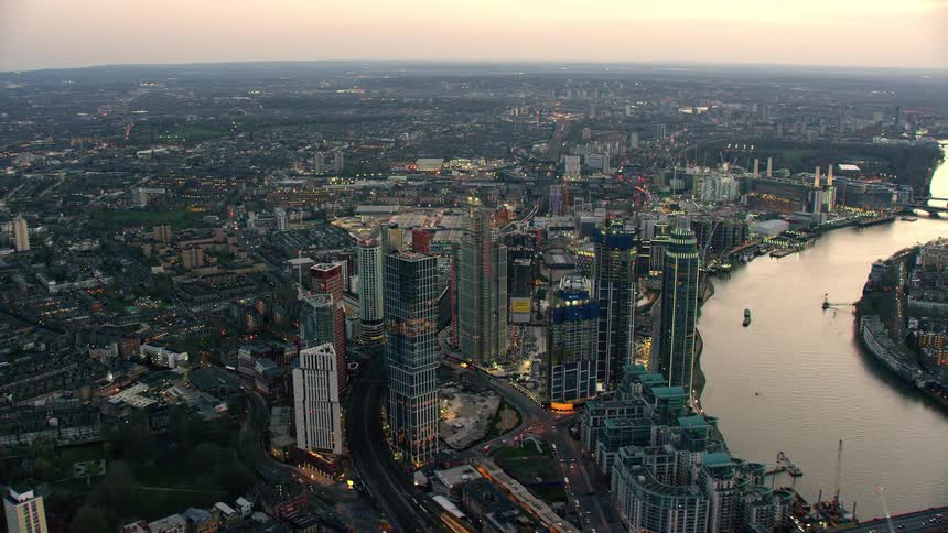 Skyscrapers on a waterfront in a metropolis in the evening
