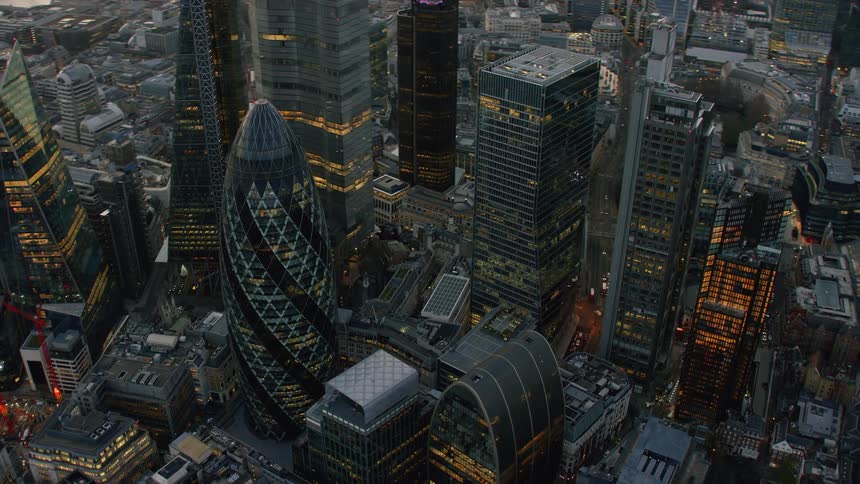Aerial view of tall skyscrapers in london downtown at evening