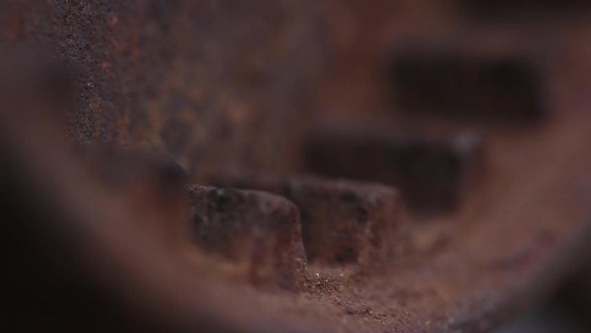 The grooves in a rusty metal object