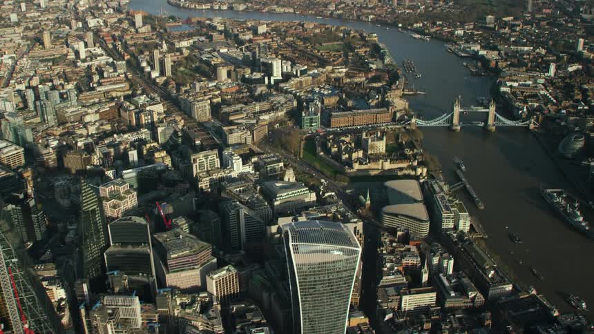 Aerial view of buildings near the thames river in london at daytime