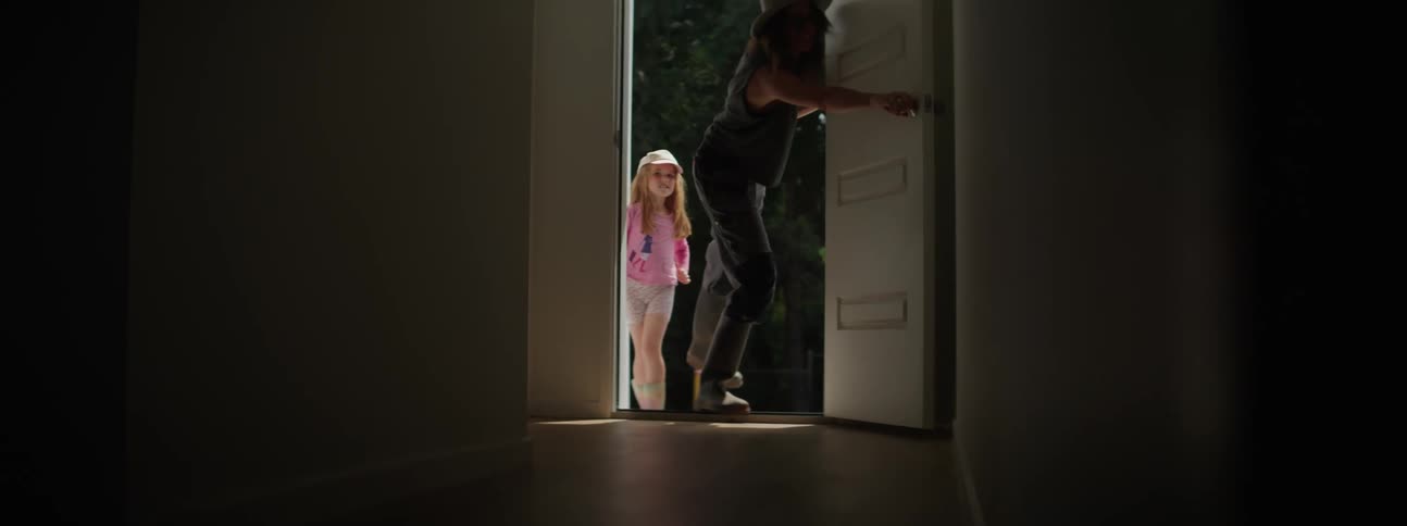 Mother and daughter high five each other before going out on a walk