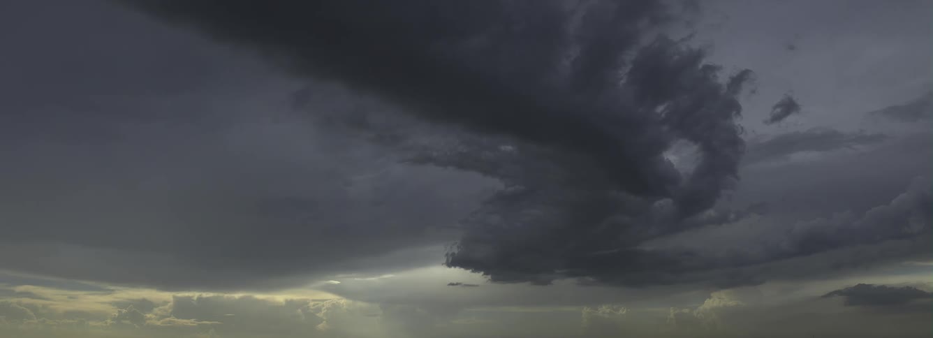 Dark storm clouds move across the sky