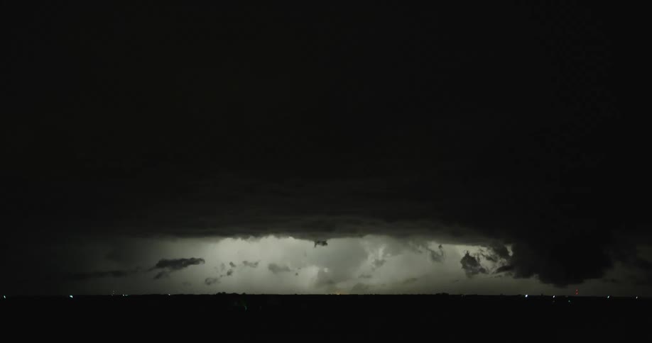 A thunderstorm with lightening in the night sky