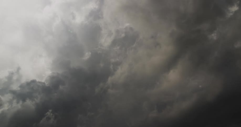 Dark storm clouds move across the sky