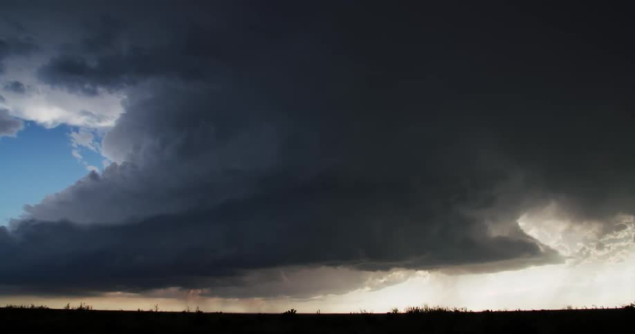 Dark storm clouds gather in the sky