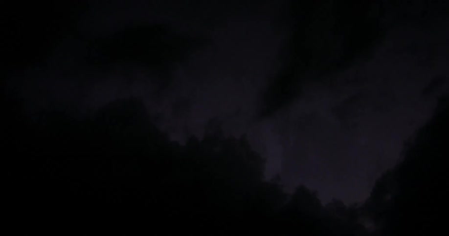 Time lapse of lightning inside ominous dark clouds on a thunderstorm at night