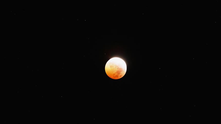 Glowing celestial body moves through space