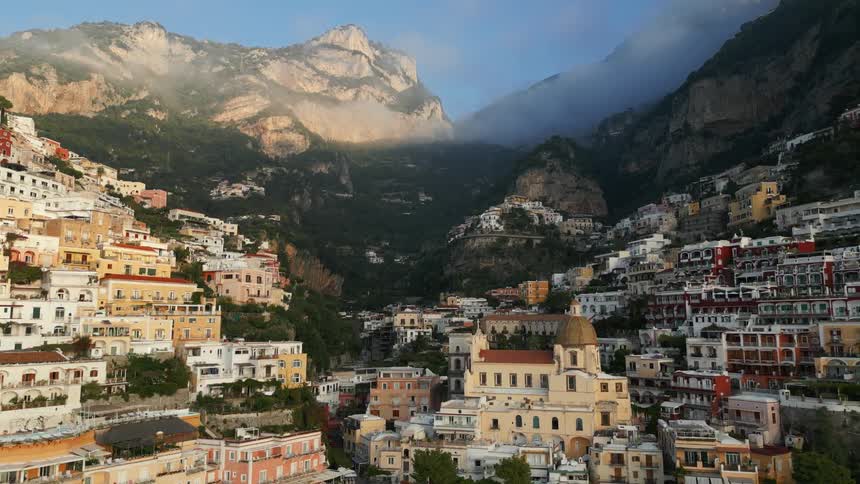 Buildings and homes on a hillside in a city